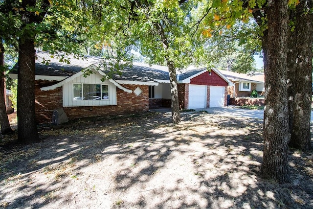 single story home with a garage