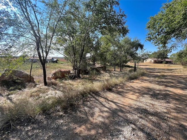 view of road featuring a rural view