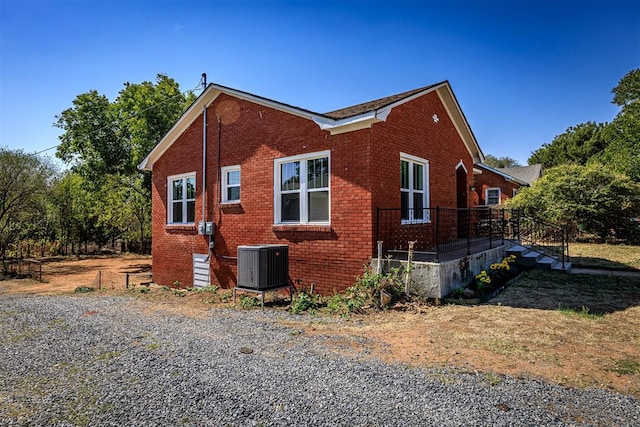 view of home's exterior with cooling unit