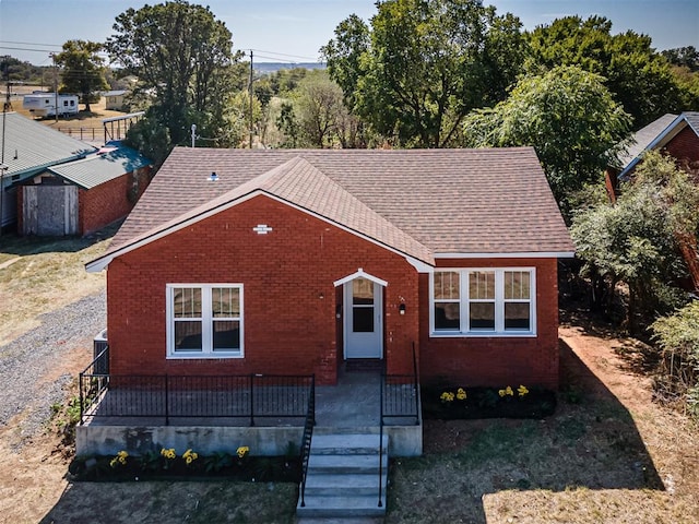 view of front of home featuring covered porch