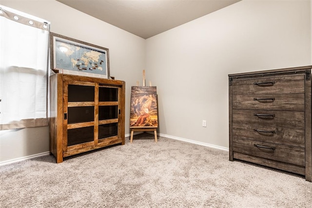 sitting room with light colored carpet