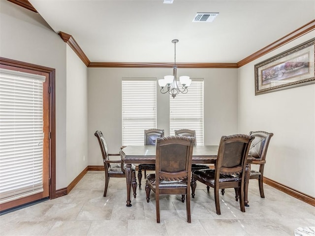 dining area featuring a chandelier and ornamental molding