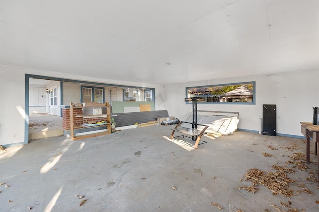 interior space featuring concrete flooring