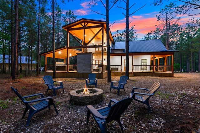 playground at dusk with a fire pit