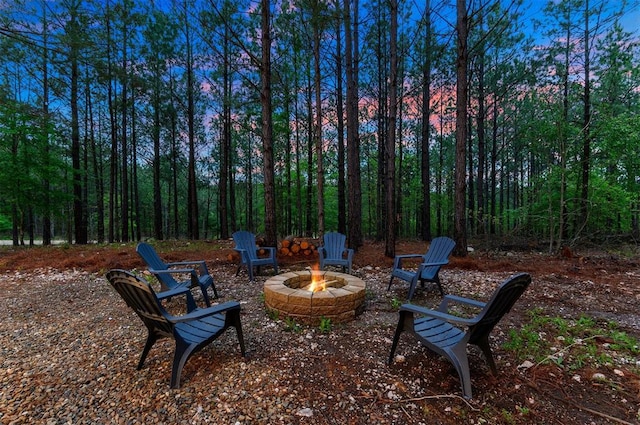 view of patio / terrace with an outdoor fire pit