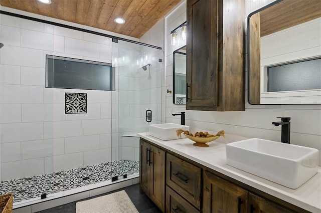 bathroom with vanity, an enclosed shower, and wooden ceiling