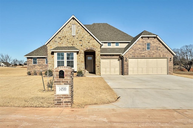 view of front of property featuring concrete driveway, brick siding, and a shingled roof