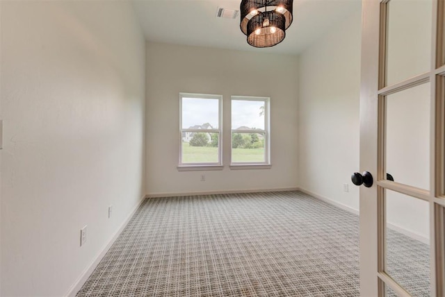 14500 Rushing Ln, Edmond, OK 73025 - carpeted empty room featuring baseboards