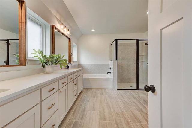 14500 Rushing Ln, Edmond, OK 73025 - bathroom with a shower stall, a garden tub, double vanity, and recessed lighting