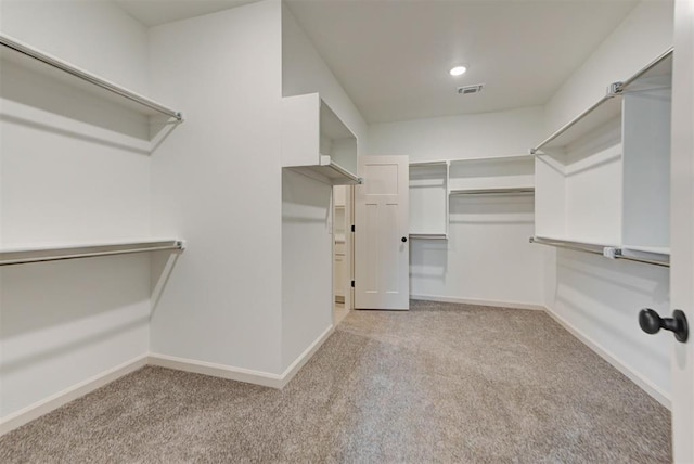 14500 Rushing Ln, Edmond, OK 73025 - spacious closet with carpet flooring