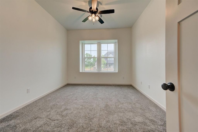 14500 Rushing Ln, Edmond, OK 73025 - spare room with carpet floors, a ceiling fan, and baseboards