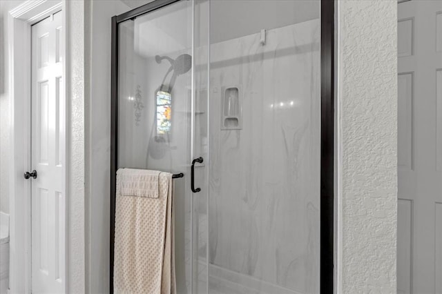 bathroom featuring walk in shower