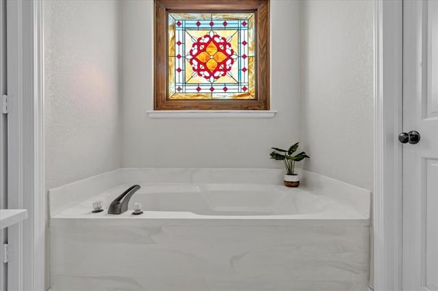 bathroom featuring a bathtub