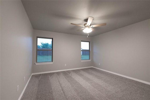 12333 SW 30th St, Yukon, OK 73099 - carpeted empty room featuring baseboards and a ceiling fan