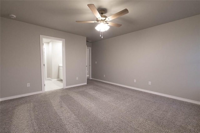 12333 SW 30th St, Yukon, OK 73099 - unfurnished bedroom with carpet, baseboards, ensuite bath, and ceiling fan