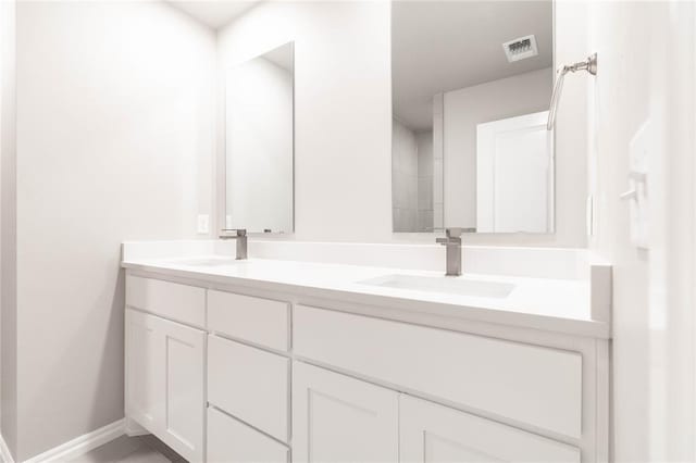 12333 SW 30th St, Yukon, OK 73099 - bathroom with double vanity and baseboards