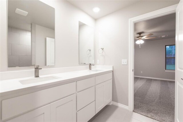12333 SW 30th St, Yukon, OK 73099 - full bathroom featuring double vanity, a ceiling fan, baseboards, recessed lighting, and tile patterned floors