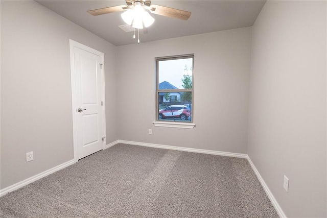 12333 SW 30th St, Yukon, OK 73099 - carpeted spare room featuring ceiling fan and baseboards