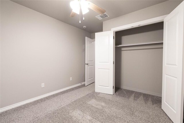 12333 SW 30th St, Yukon, OK 73099 - unfurnished bedroom featuring carpet floors, baseboards, and a closet