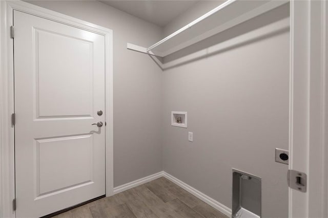 12333 SW 30th St, Yukon, OK 73099 - washroom with electric dryer hookup, hookup for a washing machine, baseboards, and wood finished floors