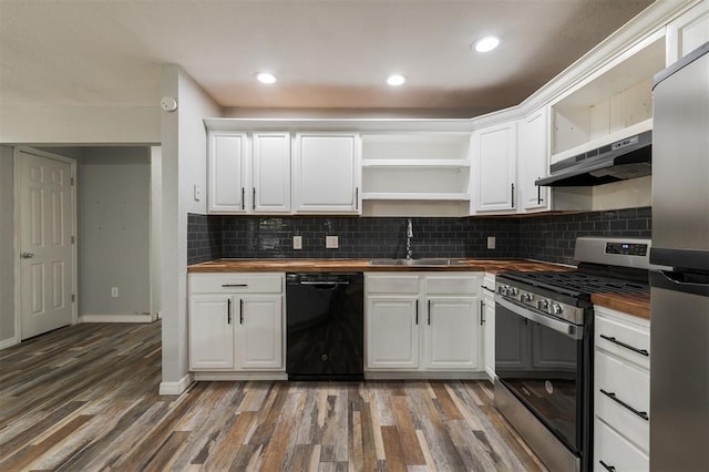 kitchen featuring sink, white cabinets, stainless steel appliances, and wood-type flooring