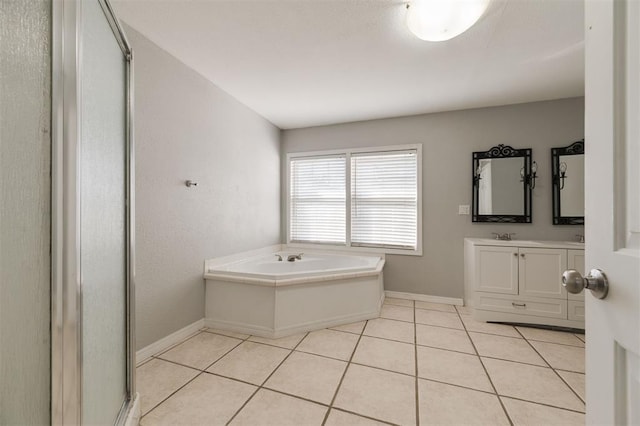 bathroom featuring tile patterned flooring, vanity, and independent shower and bath