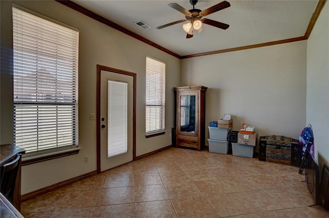 doorway to outside with ceiling fan, light tile patterned floors, and ornamental molding