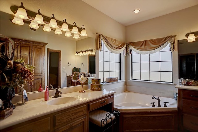 bathroom with a bathtub and vanity