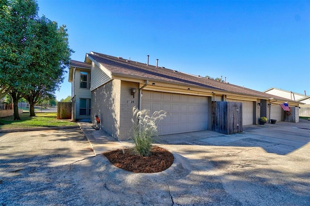 single story home featuring a garage