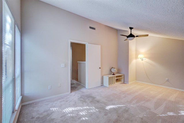 interior space featuring a textured ceiling and ceiling fan