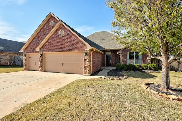 view of front of home with a garage and a front yard