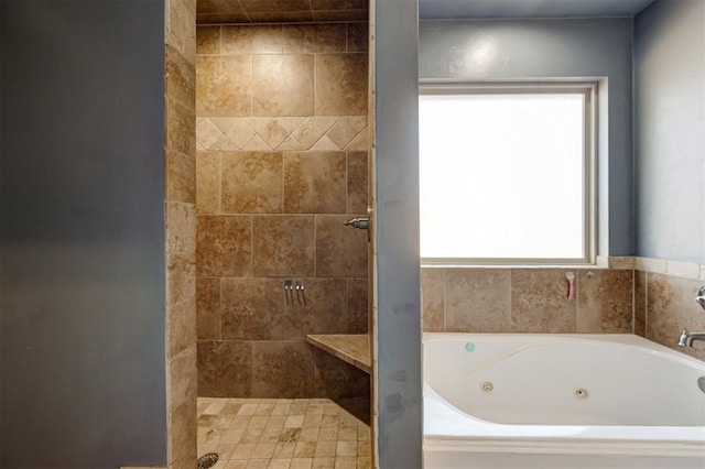 bathroom with shower with separate bathtub