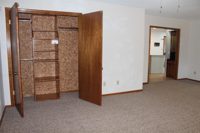 unfurnished bedroom with carpet