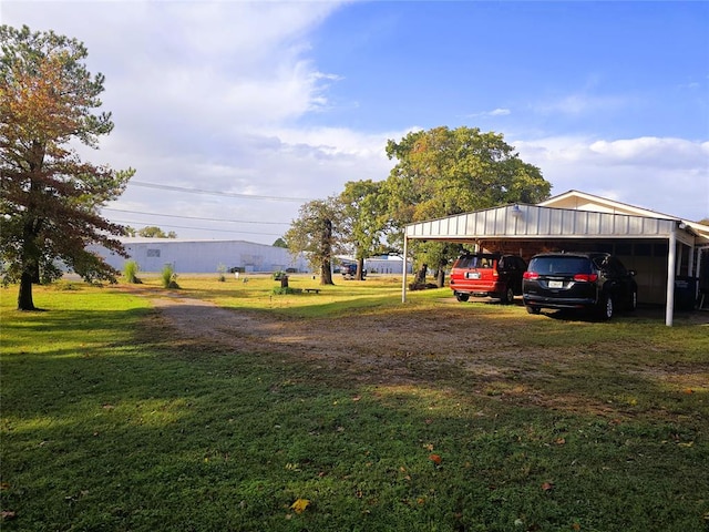 view of yard featuring a carport