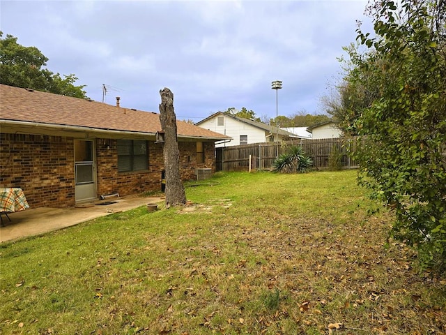 view of yard with a patio area and cooling unit