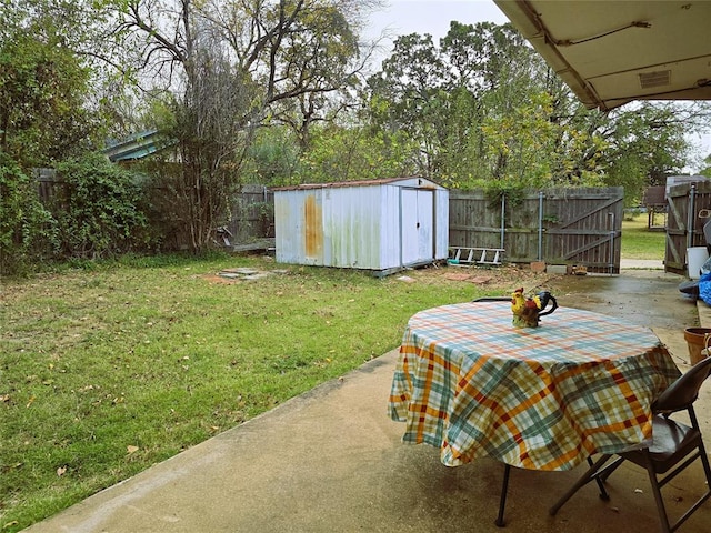 exterior space featuring a storage shed and a patio