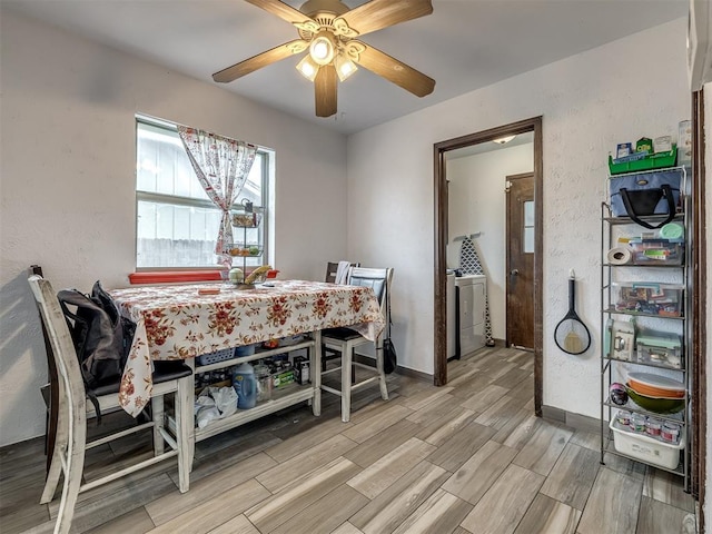 dining area featuring ceiling fan and light hardwood / wood-style floors