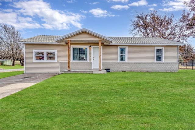 ranch-style home with a front yard