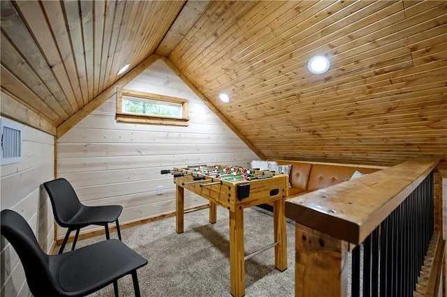 recreation room featuring carpet flooring, vaulted ceiling, wooden walls, and wood ceiling