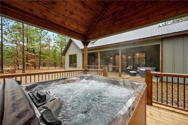 deck with a hot tub