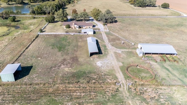 bird's eye view featuring a rural view and a water view