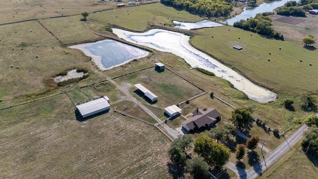 bird's eye view featuring a rural view and a water view