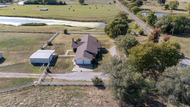 bird's eye view featuring a rural view and a water view