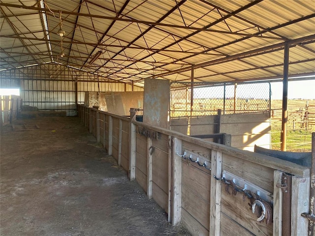 view of stable featuring a rural view