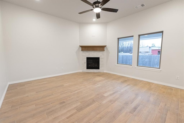 unfurnished living room with light wood finished floors, visible vents, baseboards, a ceiling fan, and recessed lighting