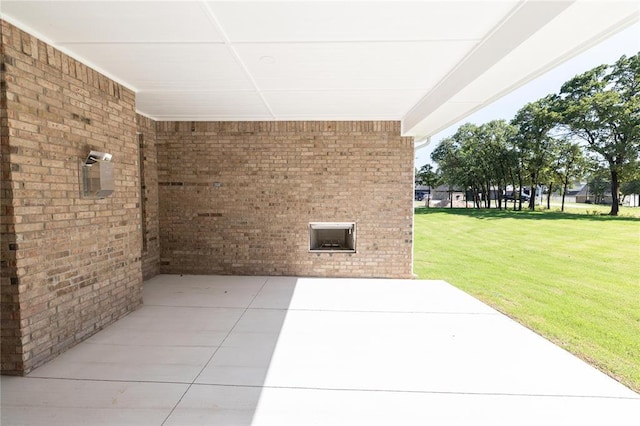 14001 Birch Ln, Edmond, OK 73049 - view of patio featuring an attached carport