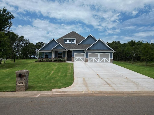14001 Birch Ln, Edmond, OK 73049 - craftsman house featuring a front lawn, driveway, and a garage