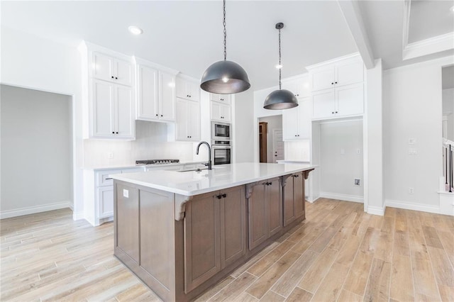 14001 Birch Ln, Edmond, OK 73049 - kitchen featuring stainless steel oven, built in microwave, white cabinetry, light countertops, and recessed lighting
