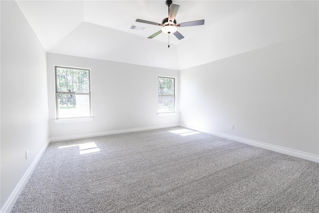 14001 Birch Ln, Edmond, OK 73049 - carpeted spare room with healthy amount of natural light, vaulted ceiling, and a ceiling fan