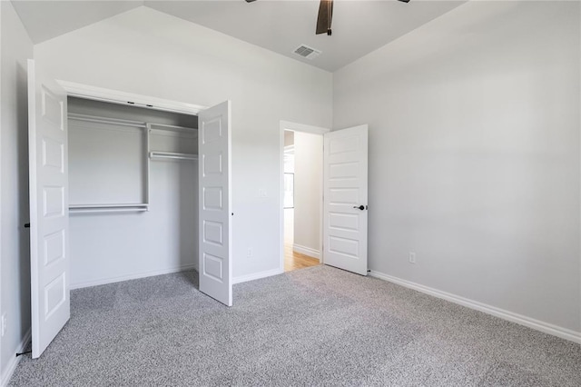 14001 Birch Ln, Edmond, OK 73049 - unfurnished bedroom featuring carpet flooring, a closet, and a ceiling fan